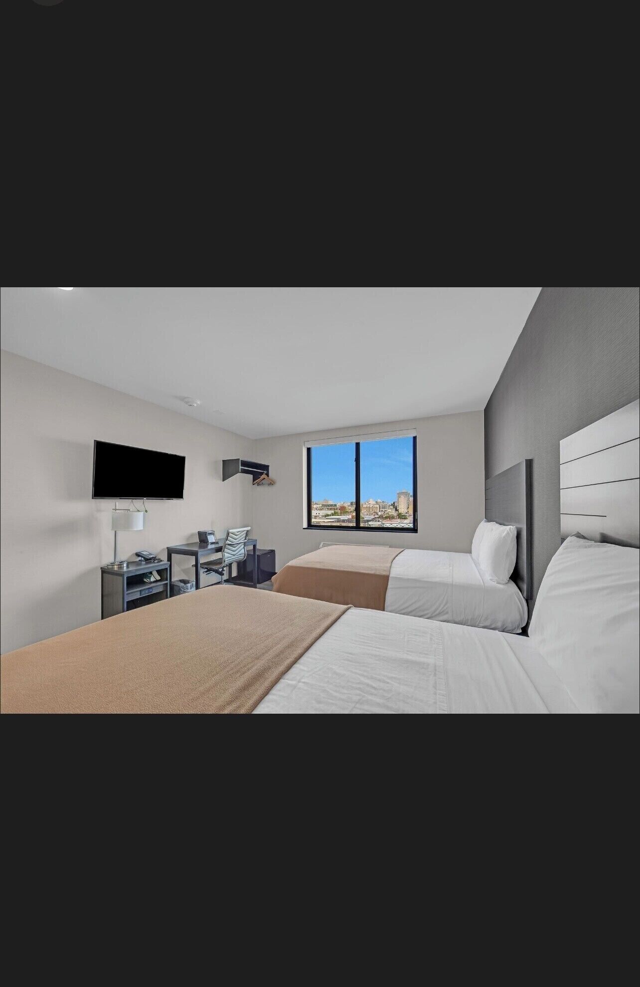 Desk, laptop workspace, blackout curtains, iron/ironing board