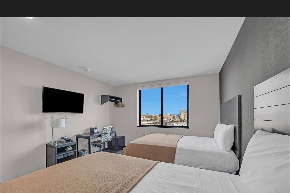 Desk, laptop workspace, blackout curtains, iron/ironing board