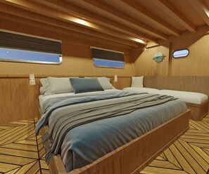 A wooden-paneled room with a bed, two windows, and a small wall clock.