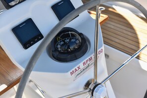 A boat's control panel with a speedometer, two screens, and a 'MAX RPM 100' label. - Sun-Kissed Sailing Adventure in Zadar, Croatia (Zadar)