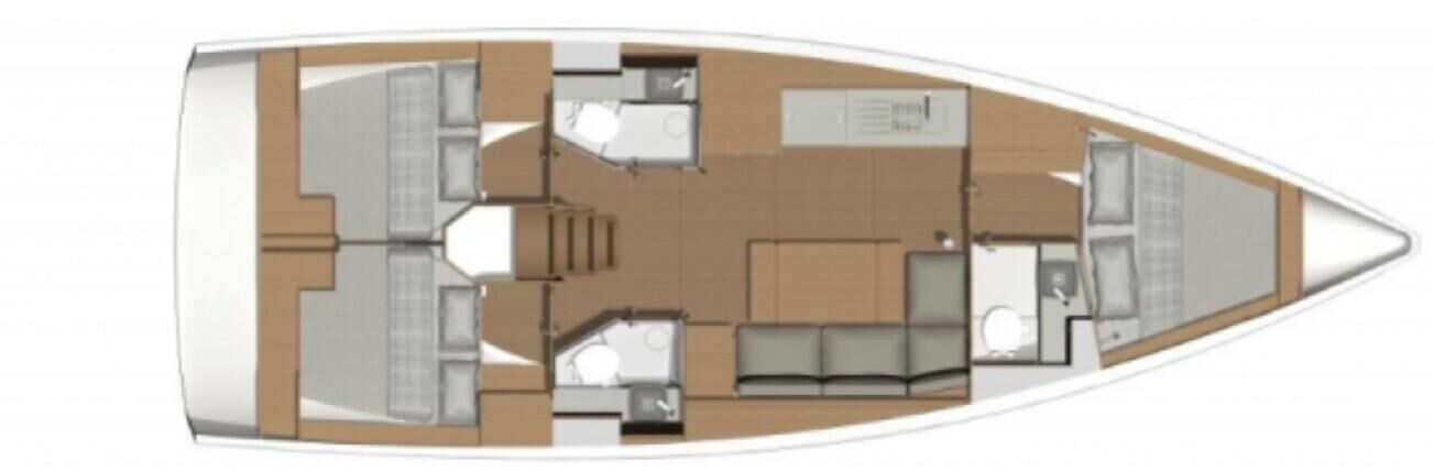 A boat interior with a dining area, kitchen, and seating space.