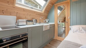 A compact kitchen with a skylight, a sink, and a toaster. - Greendale Glamping - Sunrise Pod (No Hot Tub) (Chatburn)