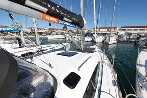 A marina with multiple sailboats docked. - Sibenik Sun-soaked Sailing: A Luxurious Croatian Voyage (Pirovac)