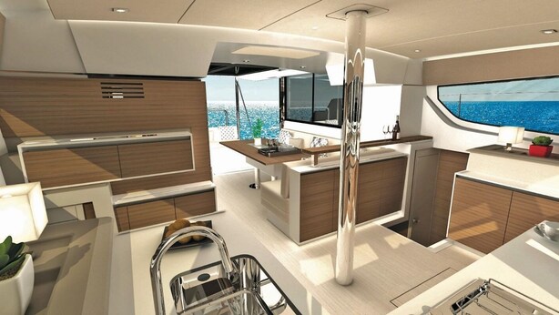 A modern yacht interior with a central kitchen area, a dining space, and a large window offering a view of the sea. - Caribbean Bliss: Sun-soaked Sailing Adventure from San Vicente y las Granadinas (Ribishi)