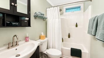 Hair dryer, towels, soap, toilet paper