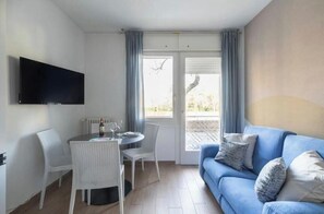Living area - Wallpaper Suites – 2 Bedrooms, 2 Bathrooms, and a Small Balcony (Padova)