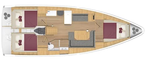 A boat interior with a dining area, two bedrooms, a bathroom, and a small kitchen.