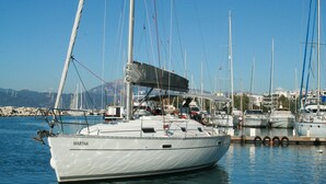 A marina with several sailboats docked, including one named 'Martha.' - Sun-Kissed Sailing Adventure in the Ionian Islands, Lefkada (Lefkada)
