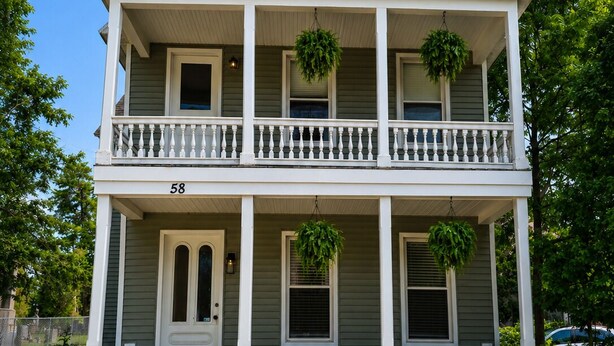 A two-story house with a front porch, a double door, and a number '58' on the front. - Short Walk to Track & Broadway, SPAC Close Too! (Saratoga Springs)