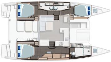 L’intérieur d’un bateau comprend un espace repas, deux cabines séparées, une cuisine et une salle de bain.
