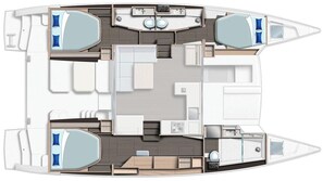 Bootinterieur met een eetgedeelte, twee aparte hutten, een keuken en een badkamer.