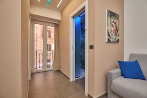 Deluxe Quadruple Room, City View | Soundproofing, iron/ironing board, free WiFi, bed sheets