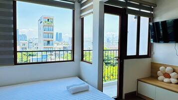 Deluxe Double Room, Balcony, City View | Desk, free WiFi