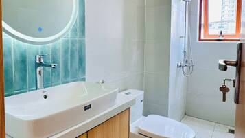 Deluxe Double Room, Balcony, City View | Bathroom | Free toiletries, hair dryer, towels, soap