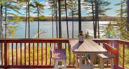 Charming Riverfront Home With Cozy Interiors, Dock, and Scenic Deck Views