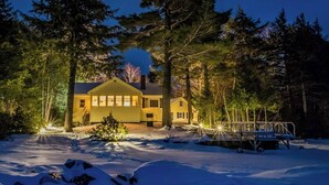 A snow-covered landscape with a house and a dock. - Lakefront Cottage w/ Beautiful Views of Moosehead Lake & Big Moose Mountain (Greenville)