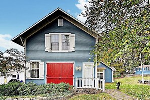 A blue house with a red door, white shutters, and a small porch. - Historical New England Home, Outdoor Shower , Dog-friendly (Boothbay Harbor)