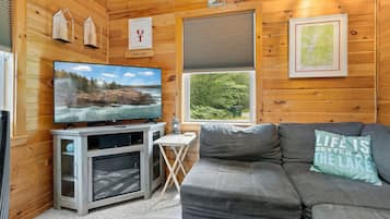 Cabin, Multiple Beds, Fireplace (The Grand Loon) | Living area