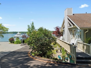 A waterfront property with a gazebo, a covered porch, and a view of the lake. - Mabel's Maine Studio on the River (Edgecomb)