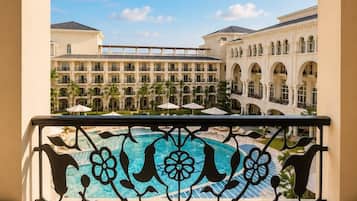 Premium Room, Balcony, Pool View | Property grounds