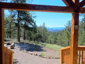 A wooden structure with a sign reading 'OVERLOOK LN.'