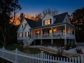 A two-story house with a porch, a staircase, and a picket fence. - Salt & Cedar House -large gathering spaces, 5 min to stone harbor, Bar&Game Room (Middle Township)