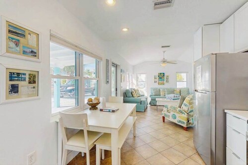 Colorful beach cottage w heated private pool & grill area - dog-friendly