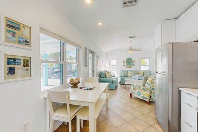 Colorful beach cottage w heated private pool & grill area - dog-friendly