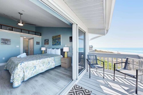 Beachfront condo with WiFi, two decks, Gulf views & pool - walk to the trolley