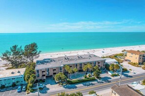 Exterior - Luxury Gulf-front condo with beach access, heated pool, sunset views, & balcony (Bradenton Beach)