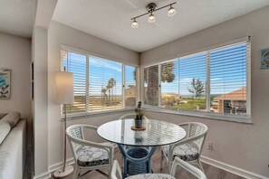 Dining - Serene oceanfront suite with Gulf view, grill, patio, central AC, & WD (Holmes Beach)