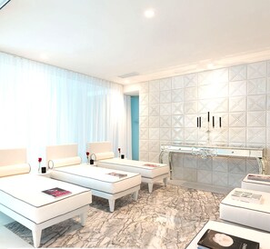 A modern hotel room with a marble floor, white furniture, a vanity with a mirror, and a chandelier. - Yoo Panama (Panamá)