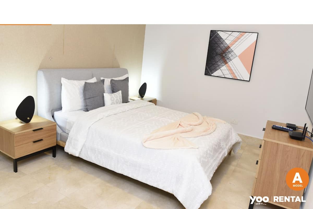 Desk, laptop workspace, blackout drapes, iron/ironing board