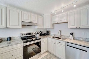 Coffee/tea maker, fridge, microwave, oven - Serene oceanfront suite with Gulf view, grill, patio, central AC, & WD (Holmes Beach)