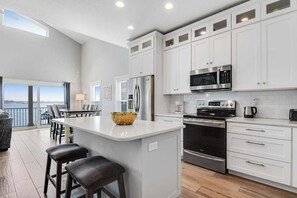 Coffee/tea maker, fridge, microwave, oven - Bayfront Home with Private Pool, Balcony Views & Walkable Beach Access (Bradenton Beach)