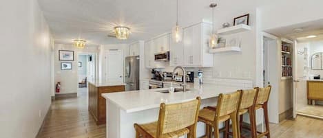 Coffee/tea maker, fridge, microwave, oven