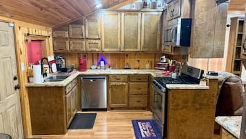 Coffee/tea maker, fridge, microwave, oven