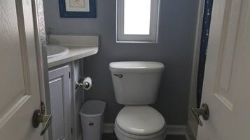 Shower, towels, soap, toilet paper