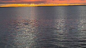 A calm body of water reflecting the sky. - Oceanview Cottage - Beach - Peaceful - Amazing Views (Cottage Name= Dune View) (Malpeque)
