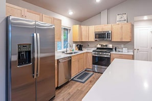 Coffee/tea maker, fridge, microwave, oven - Penguin Ridge Estate | Full 4BR Duplex Compound (Girdwood)