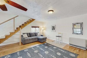TV, offices - Little Black Bear | Hillside Cottage | City Views (Anchorage)