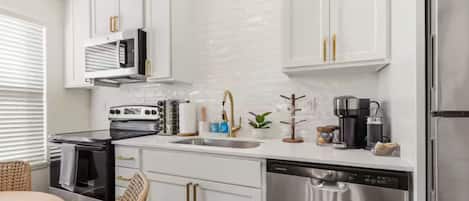 Luxury House | Private kitchen | Coffee/tea maker, full-size fridge, microwave, oven