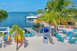 Outdoor dining - waterfront property, bring your boat and keep it in he water your entire stay. (Key Largo)