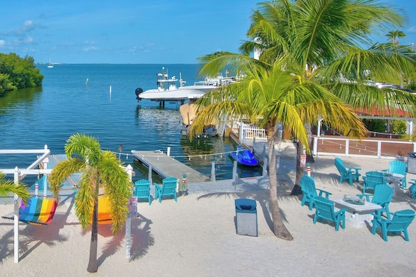 Outdoor dining - waterfront property, bring your boat and keep it in he water your entire stay. (Key Largo)