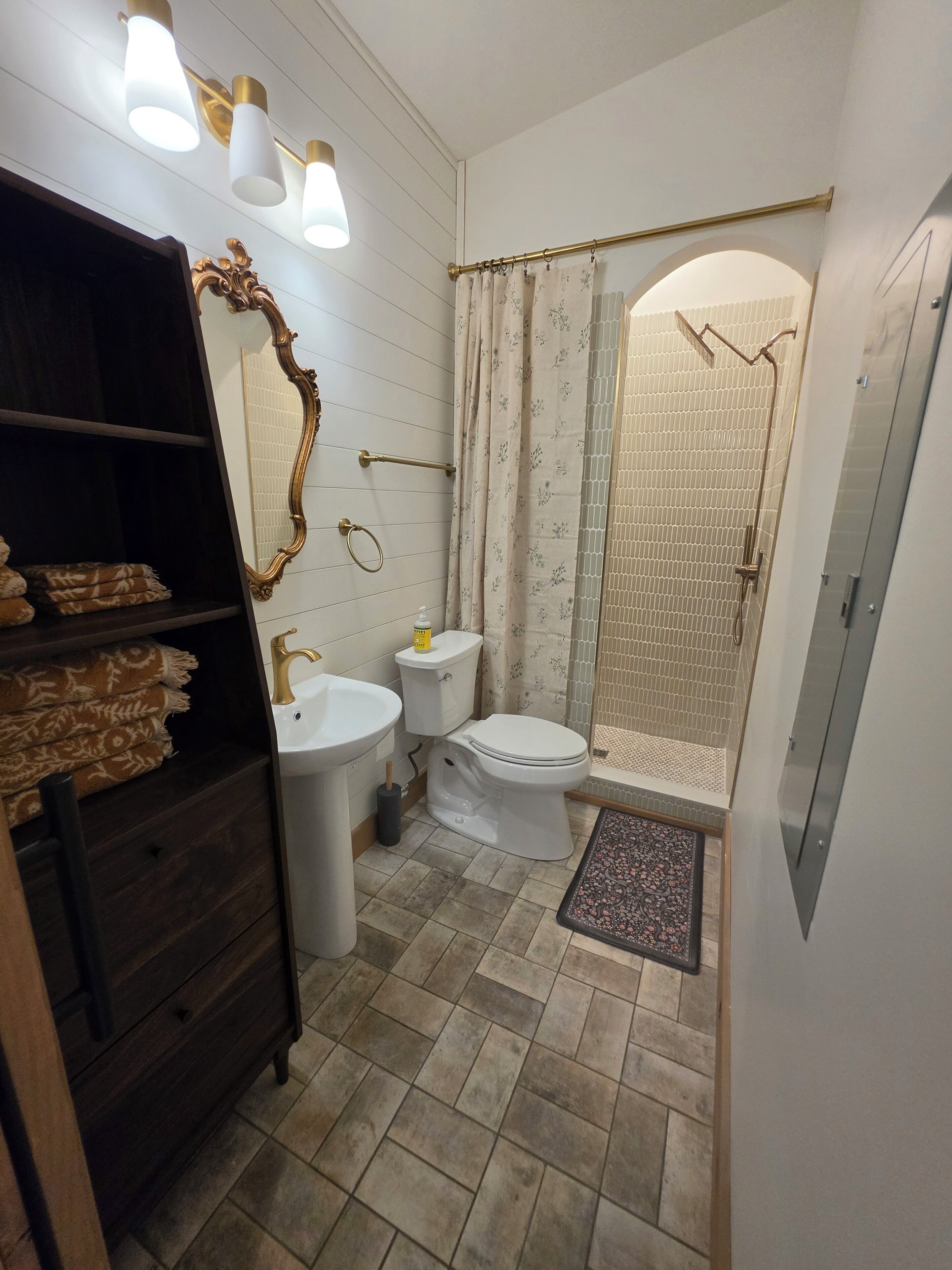 Shower, towels, toilet paper
