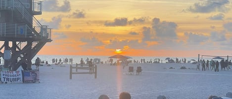 On the beach, sun loungers, beach towels