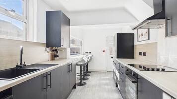 Fridge, oven, stovetop, cookware/dishes/utensils