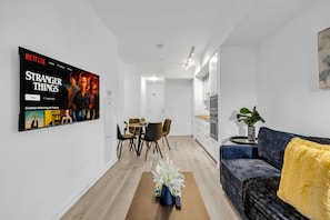 Elite Suite, Multiple Beds, Non Smoking, Private Bathroom | Living area | 50-inch TV with digital channels - Maple Square Hotel (Toronto)