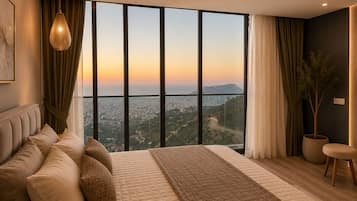 A modern bedroom with a large bed, a hanging light fixture, a view of a cityscape, and a potted plant.
