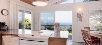 Take In Stunning Ocean Views from a Charming Home with Balcony